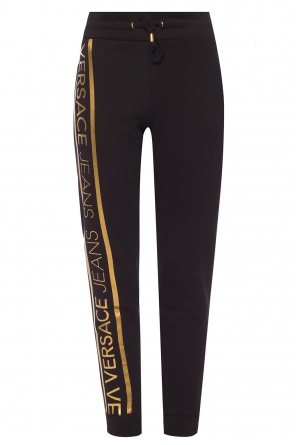 Spodnie z paskami z logo, zdjęcie 1 Spodnie z paskami z logo od Versace Jeans